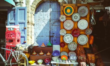 blue and white wooden round wall clock