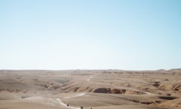 brown sand under sunny sky